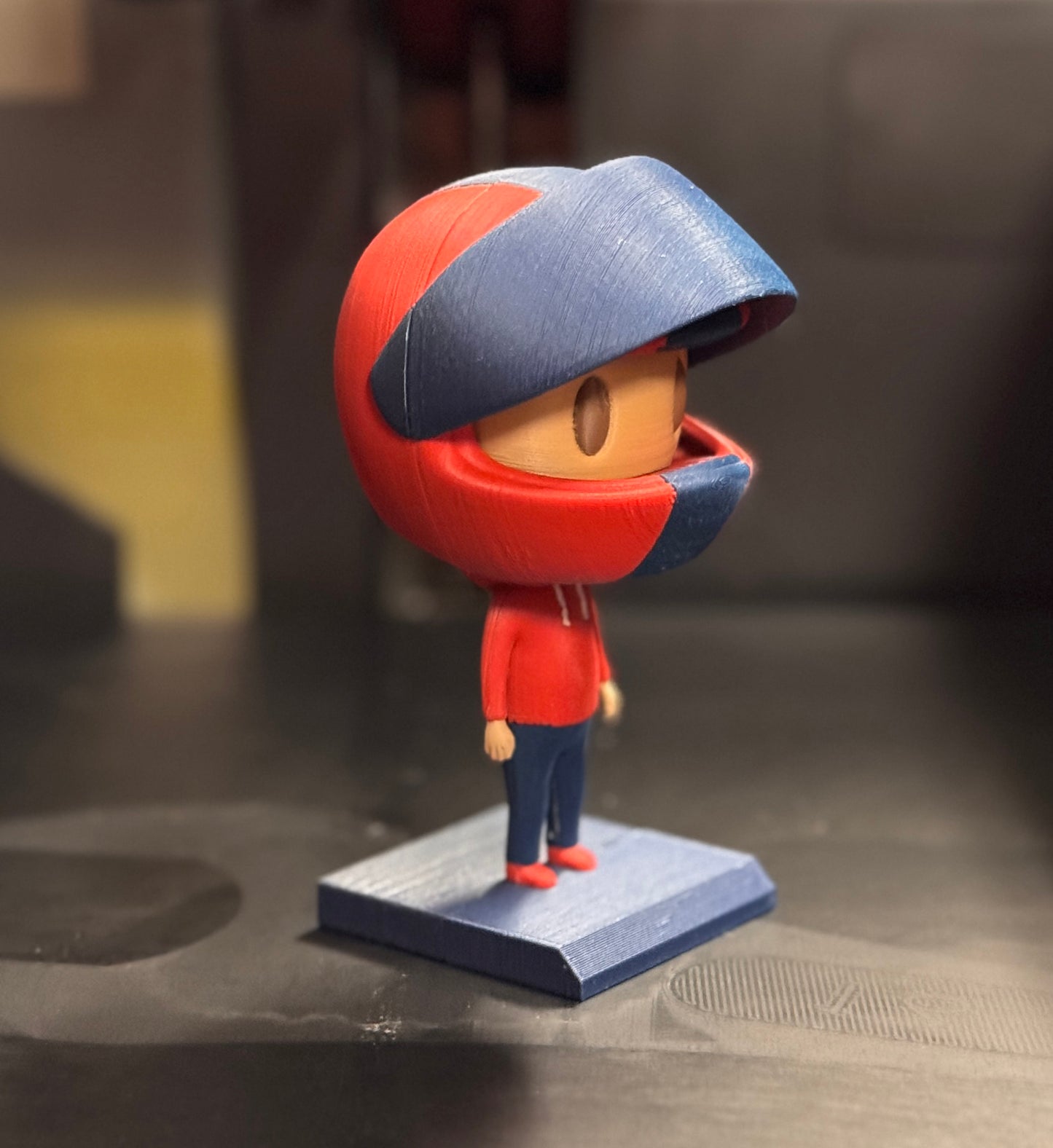 Red and Blue 3D Printed Figure from the Side